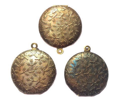 vintage antiqued brass round locket with twig texture