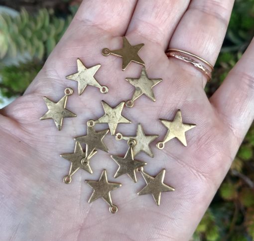 small tarnished brass engraving star charms