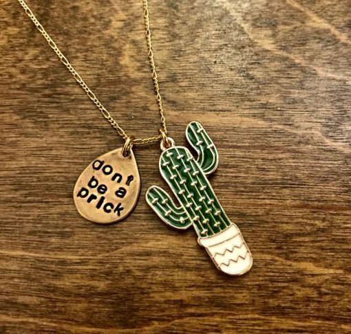 cactus necklace with an engraved charm saying dont be a prick