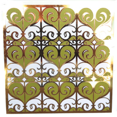 Green and gold swirly heart design vintage tile
