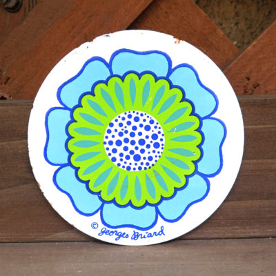 blue green and white flower circle shaped tile