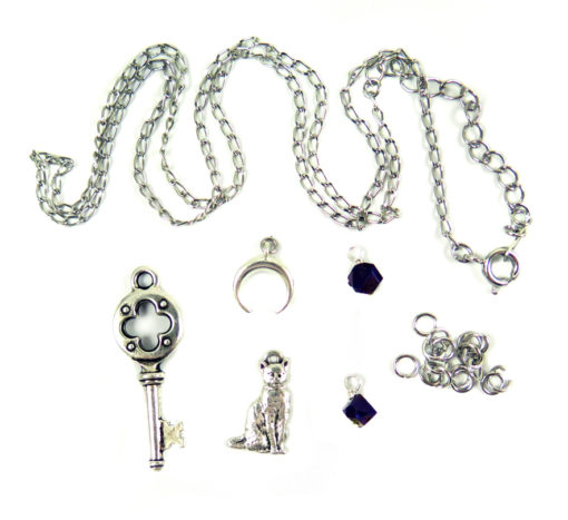 silver tone DIY charm kit with key moon cat crystal jump rings and chain