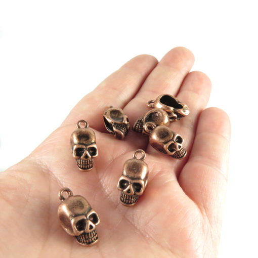 antiqued copper 3 zinc skull charms