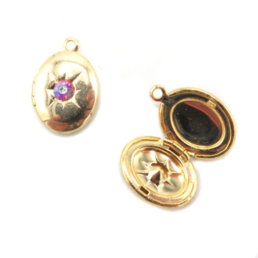 gold plated oval locket with rhinestone