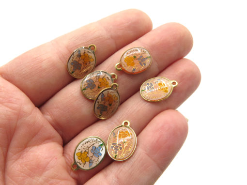 oval enamel charms - in hand