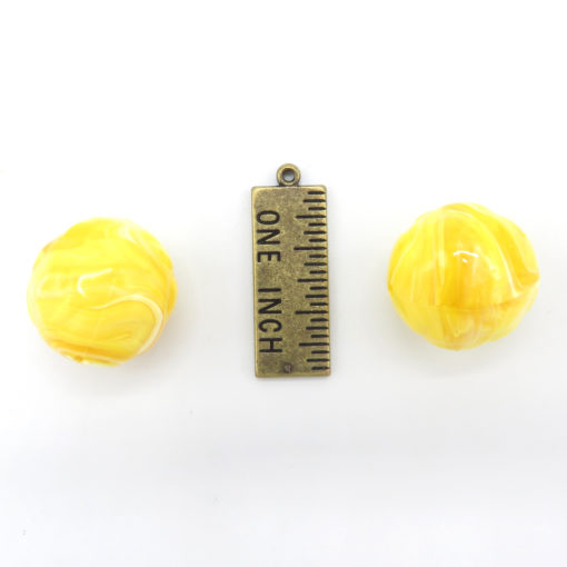 giant yellow textured circle beads -
