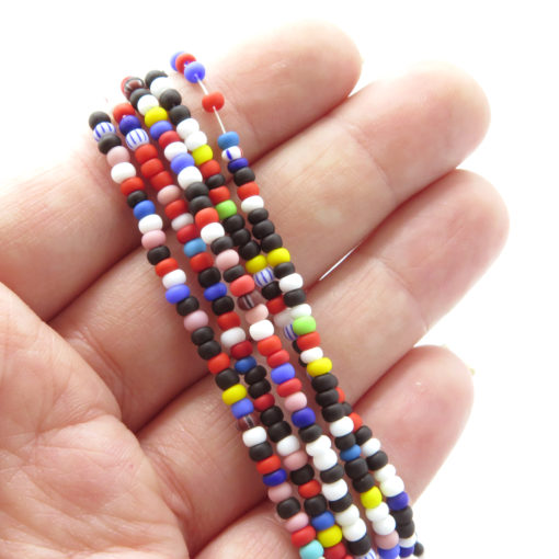 Small opaque matte seed bead strands